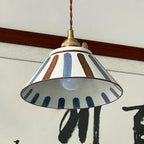 Ceramic conical pendant light with blue stripe pattern shade and twisted cord
