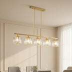 Gold 5-light linear chandelier with five clear cylindrical glass shades, hanging rods