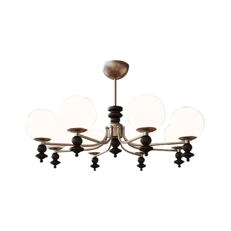 Multi-arm globe chandelier with five white globe shades and a bronze central canopy