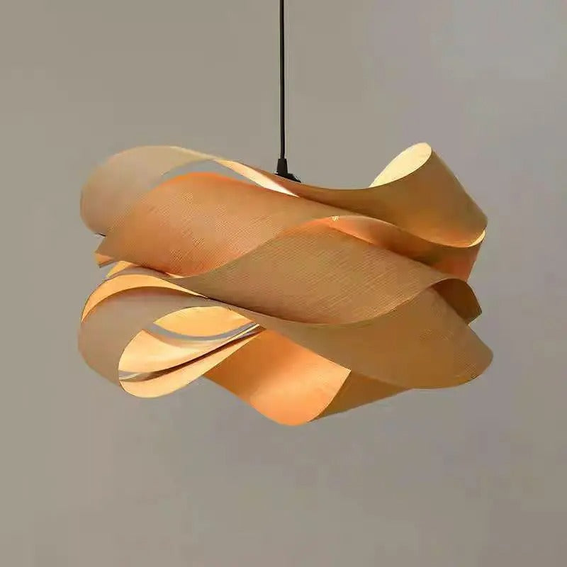 Japandi wood veneer ribbon pendant light with warm amber ribbon shade