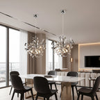 Silver branch chandelier with cascading sequin discs and glowing bulbs, modern pendant