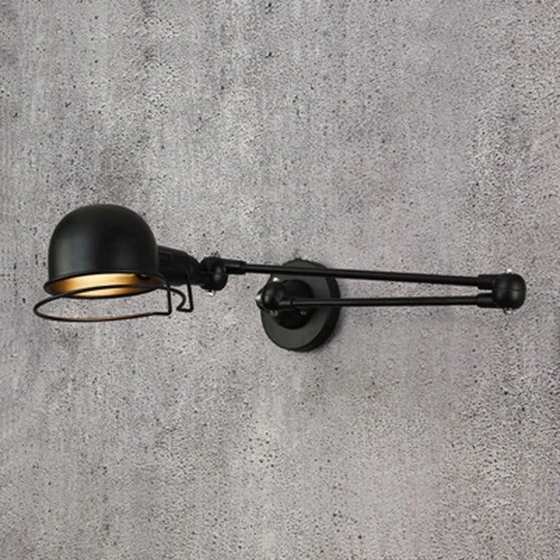 Black dome swing arm wall light with long horizontal arm and round back plate