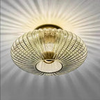 Amber fluted saucer ceiling light with ribbed glass shade and circular recessed center