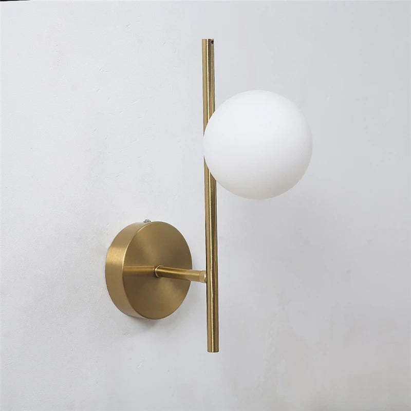 Zuvu Opal Globe vertical wall light, brushed brass round mount and frosted globe