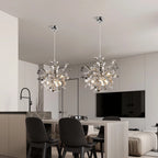 Branch chandelier pair with silver-tone sequin discs and crystal-like drops