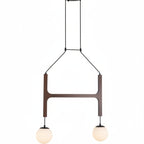 Walnut globe pendant chandelier with rectangular H-frame and two hanging orb bulbs