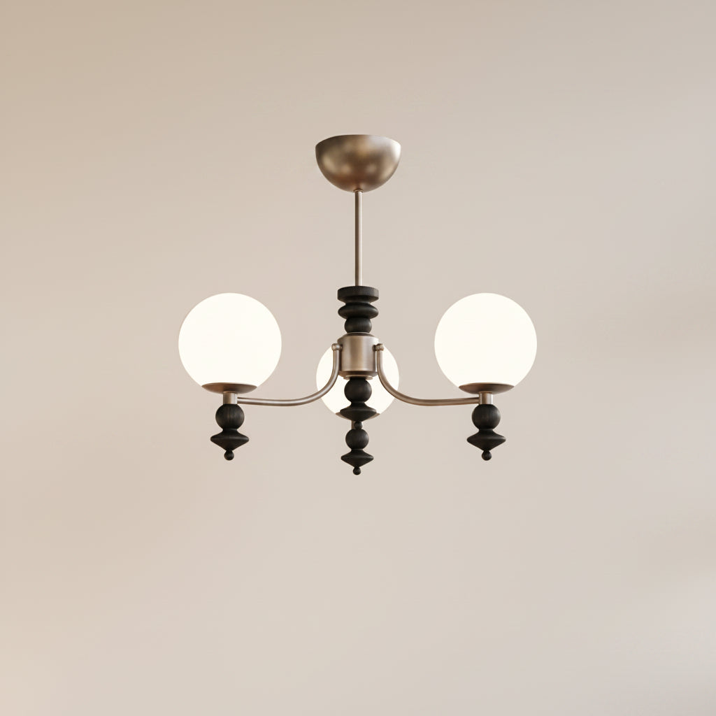 Multi-arm globe chandelier with three white globe shades and a bronze central stem