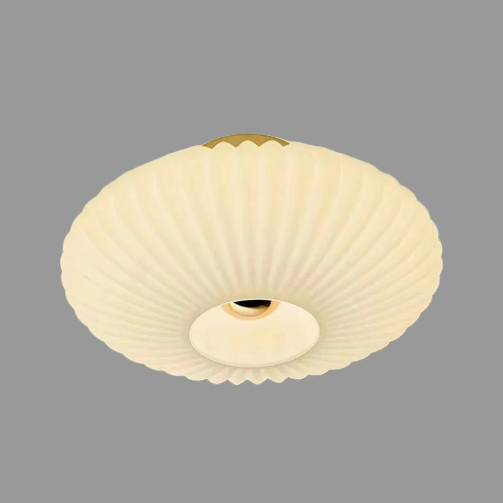 White fluted saucer ceiling light with ribbed diffuser and round recessed center