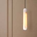 Evon alabaster tube pendant light with long cylindrical alabaster shade and black cord