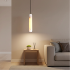 Evon alabaster tube pendant light, single long cylindrical shade on black cord
