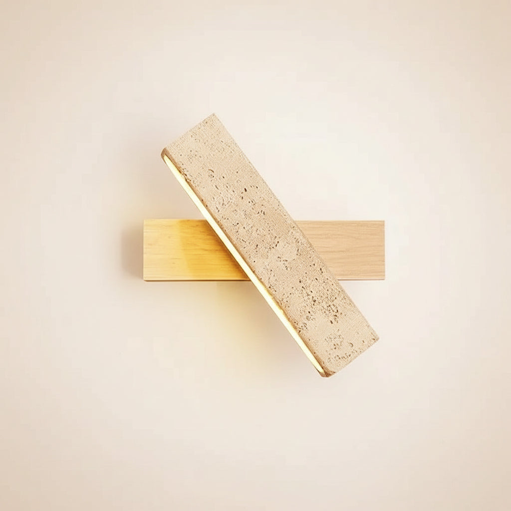 Long bar wall sconce with speckled travertine panel and light wood backplate