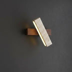 Rotatable long bar wall sconce with speckled travertine diffuser and glowing LED light