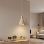 Fluted cone pendant light with textured cone shade and light wood canopy on cord