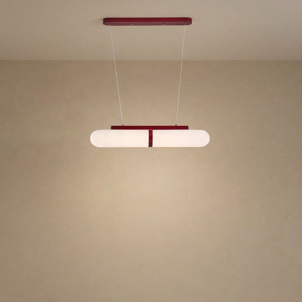 Izor linear fluted chandelier with two ribbed white shades and red ceiling canopy