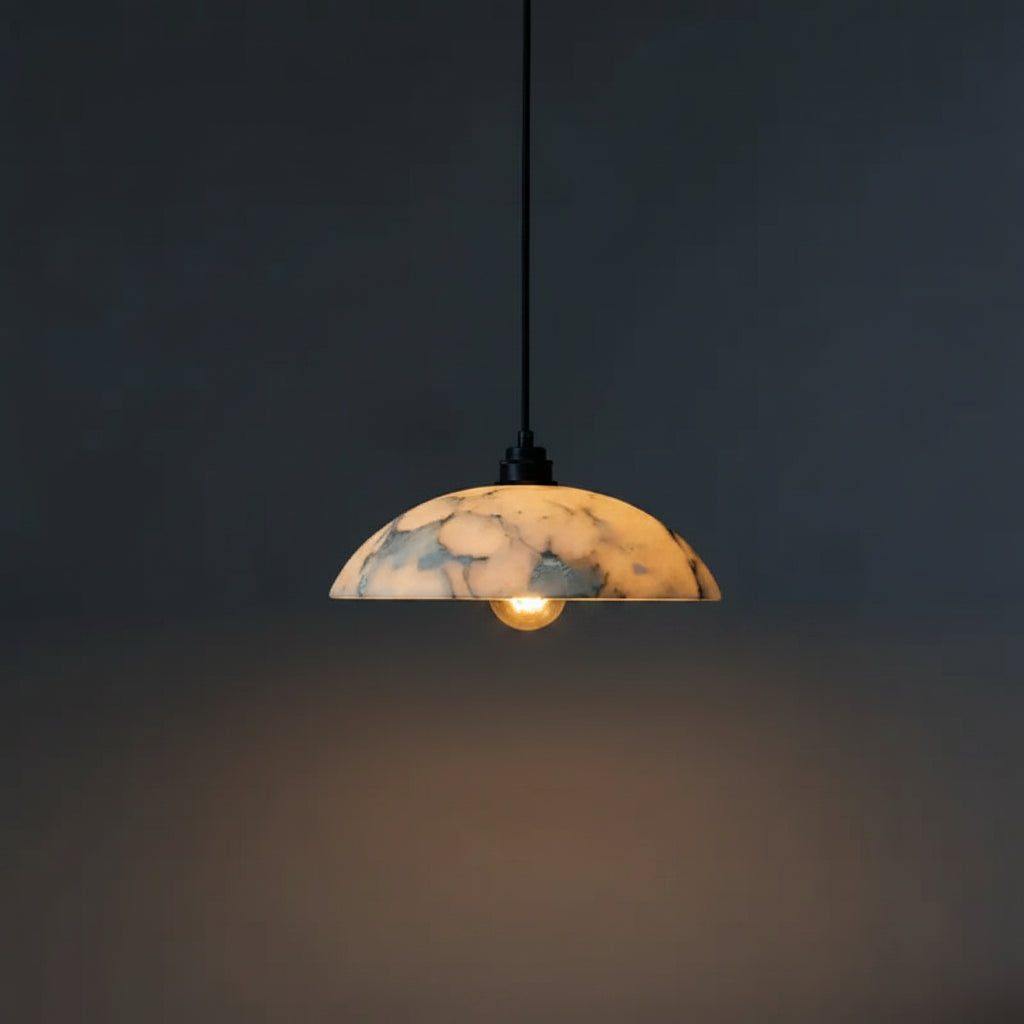 Alabaster domed pendant light with black cord and marble-pattern shade