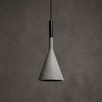 Conical concrete pendant light, speckled gray cone shade with black cord and stem