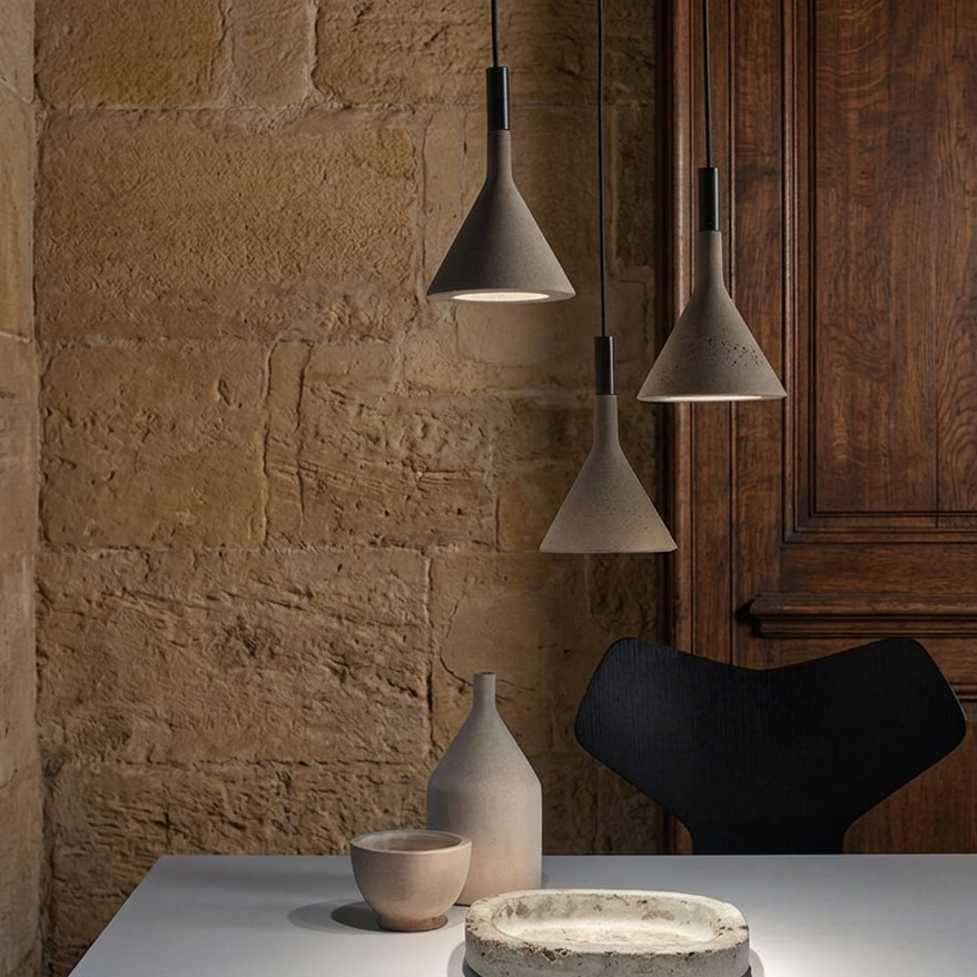 Conical concrete pendant lights, speckled gray shades with black cord and canopy