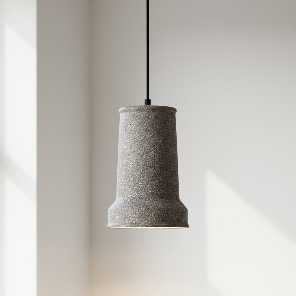 White terrazzo stepped cone pendant light with flared bottom and black cord