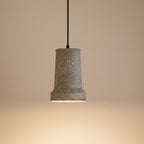 White terrazzo stepped cone pendant light with black cord and top canopy