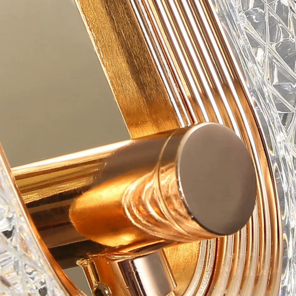 Close-up of brass ring and socket inside the textured oval wall light