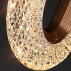 Close-up of the gold textured oval lamp cover with diamond pattern surface