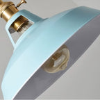 Vintage barn pendant light close-up with light blue metal shade and brass socket