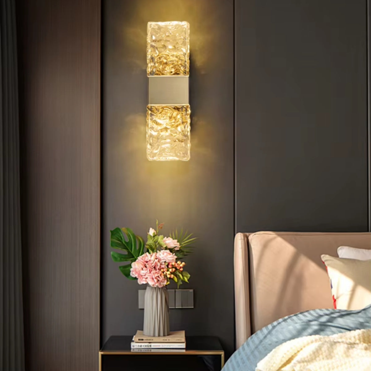 Rectangular wall light with two stacked water-ripple glass blocks, golden light.