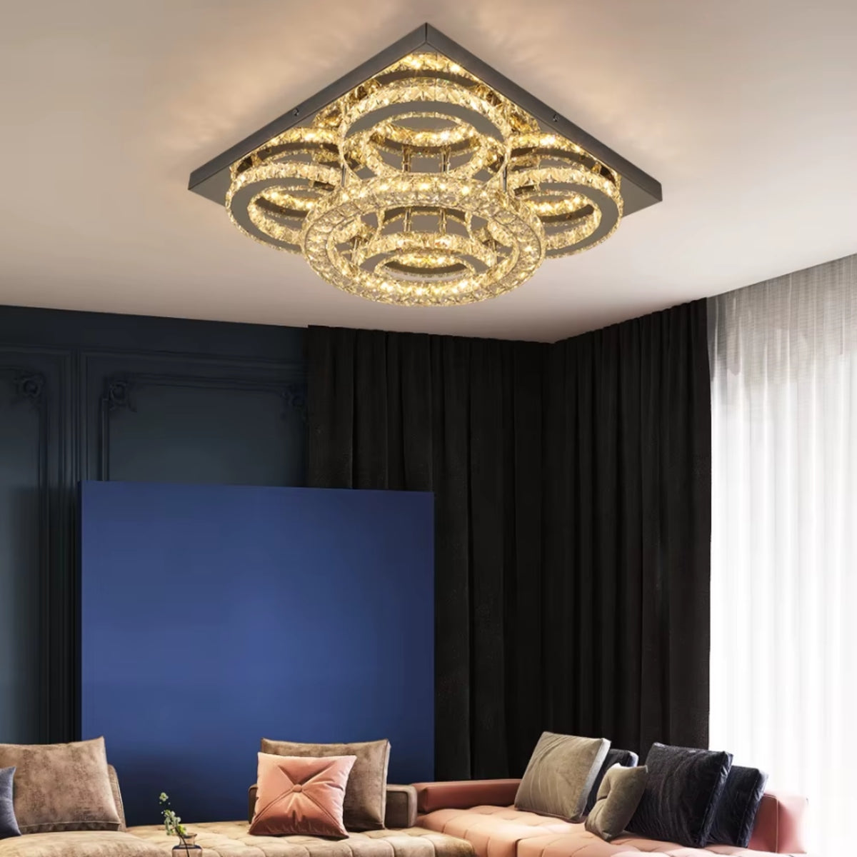 Flush-mount ceiling light with multi-tier crystal rings and warm LED glow