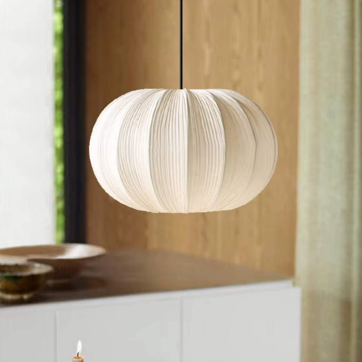 Fabric pumpkin pendant light with ribbed white shade and hanging cord