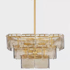 Front view square layered glass chandelier with gold frame and hanging stem