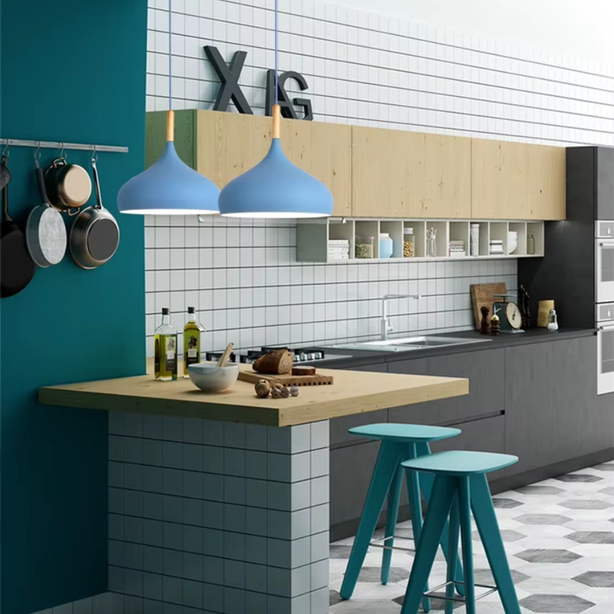Set of blue dome flared pendant lights with light wood cord mounts in kitchen
