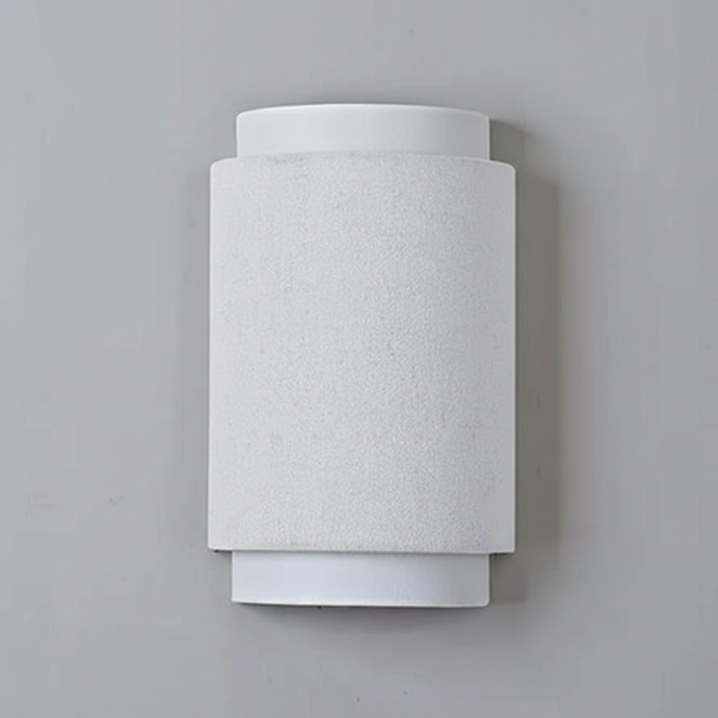 White fabric D-shaped wall light with textured cylindrical shade and backplate