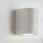 D-shaped wall light, speckled light-gray housing with round glowing LED module