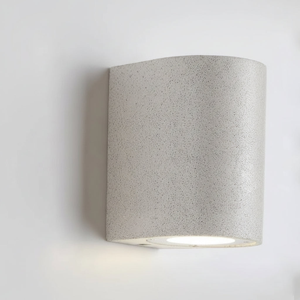 D-shaped wall light, speckled light-gray housing with round glowing LED module