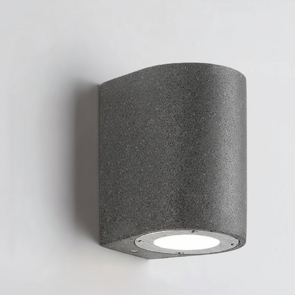 D-shaped wall light with speckled dark-gray housing and round recessed LED