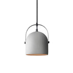 Gray bell pendant light with black metal arch and warm gold interior.