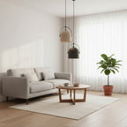 Speckled bell pendant light set with gray, black, and white shades; black metal arches.