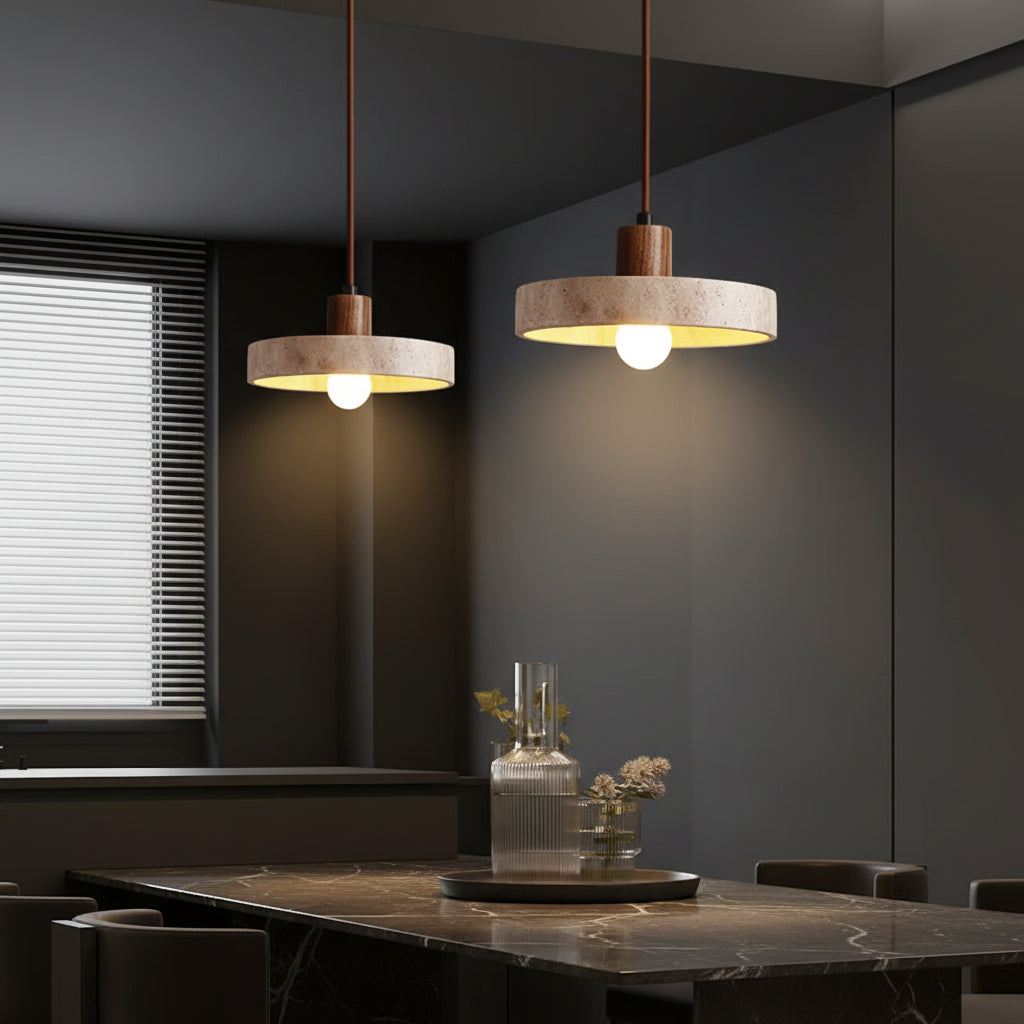 Kivor round travertine pendant light trio with warm bulbs and wood mounts