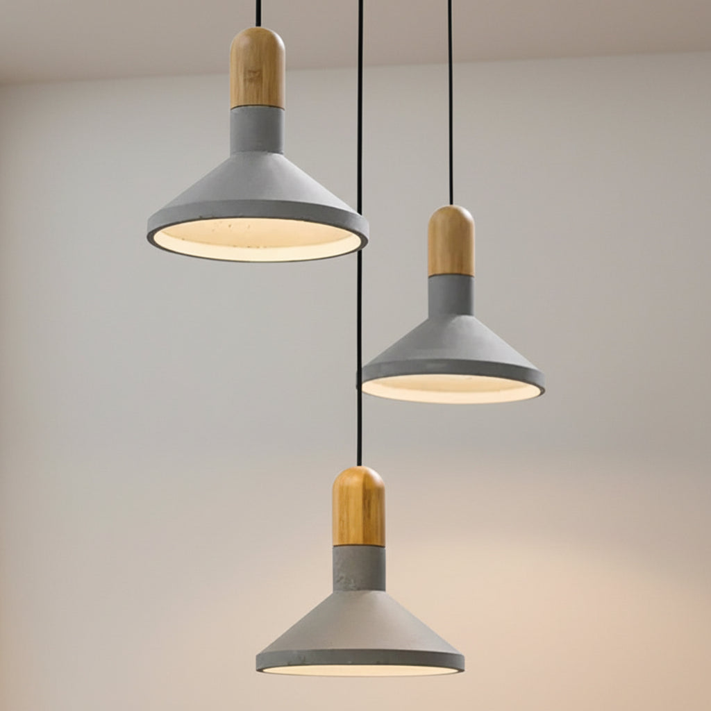 Conical pendant light set with gray metal shades and wood tops on black cords