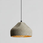 Speckled white concrete cylinder pendant light with hanging cord and underside