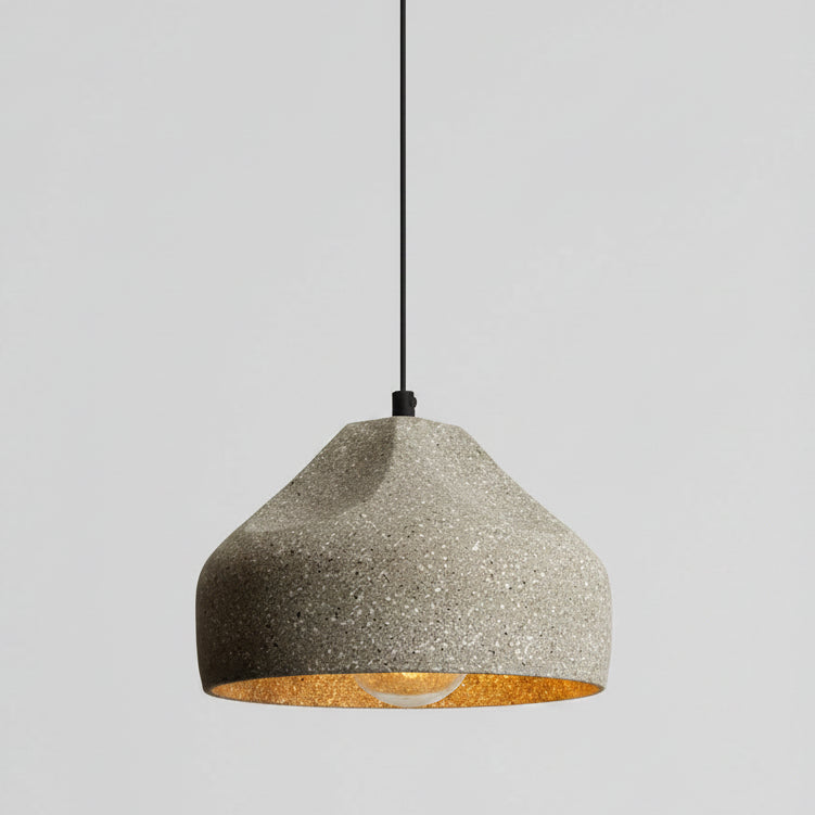 Speckled white concrete cylinder pendant light with hanging cord and underside
